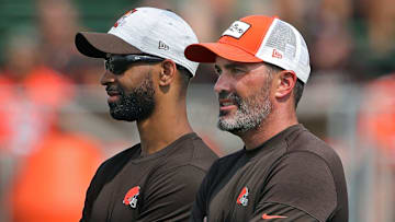 Browns GM Andrew Berry, left, and coach Kevin Stefanski watch practice in training camp, Saturday, July 31, 2021, in Berea.