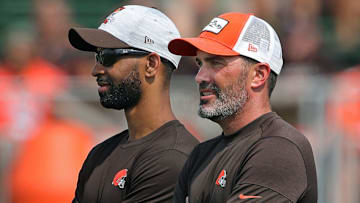Browns GM Andrew Berry, left, and coach Kevin Stefanski watch practice in training camp, Saturday, July 31, 2021, in Berea.