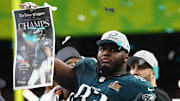 Feb 9, 2025; New Orleans, LA, USA; Philadelphia Eagles defensive tackle Milton Williams (93) celebrates on the podium after defeating the Kansas City Chiefs in Super Bowl LIX at Ceasars Superdome. 