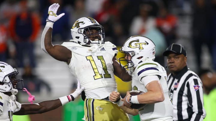 Nov 18, 2023; Atlanta, Georgia, USA; Georgia Tech Yellow Jackets quarterback Haynes King (10) celebrates after a touchdown with running back Jamal Haynes (11) against the Syracuse Orange in the second half at Bobby Dodd Stadium at Hyundai Field. Mandatory Credit: Brett Davis-USA TODAY Sports
