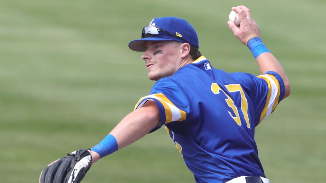 RubberDucks second baseman Travis Bazzana throws to first base in a game against the Altoona Curve on April 13, 2025, in Akron, Ohio.