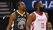May 22, 2018; Oakland, CA, USA; Golden State Warriors forward Kevin Durant (35) reacts beside Houston Rockets guard James Harden (13)  during the first quarter in game four of the Western conference finals of the 2018 NBA Playoffs at Oracle Arena. Mandatory Credit: Kyle Terada-Imagn Images