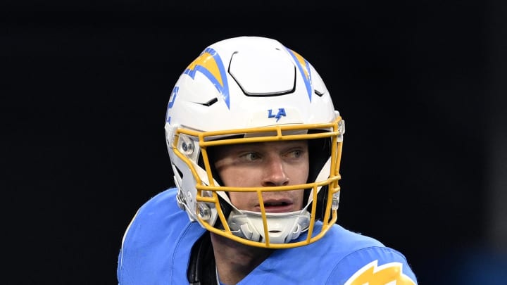 Jan 7, 2024; Inglewood, California, USA; Los Angeles Chargers quarterback Easton Stick (2) looks to pass against the Kansas City Chiefs during the second half at SoFi Stadium. Mandatory Credit: Orlando Ramirez-USA TODAY Sports