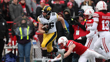 Nov 24, 2023; Lincoln, Nebraska, USA; Iowa Hawkeyes tight end Steven Stilianos (86) catches a pass against the Nebraska Cornhuskers at Memorial Stadium. Mandatory Credit: Reese Strickland-Imagn Images
