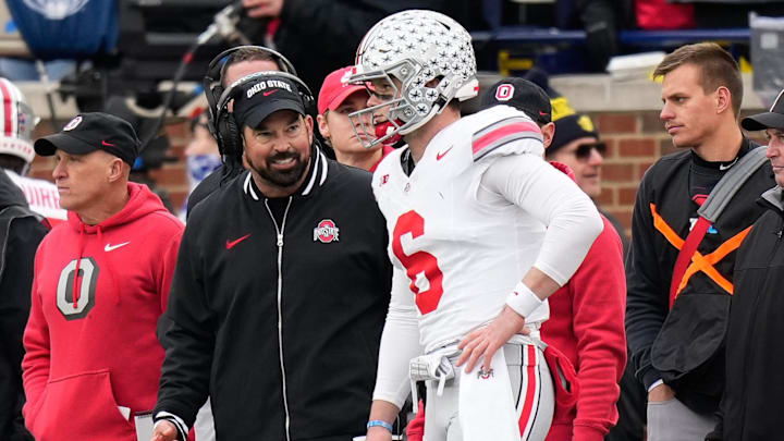 Nov 25, 2023; Ann Arbor, Michigan, USA; Ohio State Buckeyes head coach Ryan Day talks to quarterback Kyle McCord (6) on the sideline during the second half of the NCAA football game against the Michigan Wolverines at Michigan Stadium. Ohio State lost 30-24.