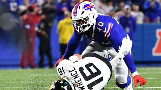 Buffalo Bills outside linebacker Von Miller (40) sacks Jacksonville Jaguars quarterback Trevor Lawrence (16).