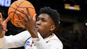 Mar 23, 2025; Seattle, WA, USA; Maryland Terrapins center Derik Queen (25) drives to the basket against Colorado State Rams forward Jaylen Crocker-Johnson (8) in the first half at Climate Pledge Arena. Mandatory Credit: Steven Bisig-Imagn Images