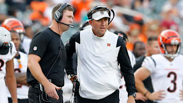 Cincinnati Bengals head coach Zac Taylor talks with defensive coordinator Lou Anarumo in the fourth quarter of the NFL Preseason Week 3 game between the Cincinnati Bengals and the Miami Dolphins at Paul Brown Stadium in downtown Cincinnati on Sunday, Aug. 29, 2021. The Dolphins made a long touchdown drive in the fourth quarter to win 29-26.

Miami Dolphins At Cincinnati Bengals Preseason