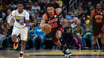 Nov 29, 2025; Indianapolis, Indiana, USA; Chicago Bulls guard Tre Jones (30) brings the ball up court against Indiana Pacers guard Bennedict Mathurin (00) during the first half at Gainbridge Fieldhouse. Mandatory Credit: Trevor Ruszkowski-Imagn Images