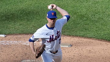 Apr 14, 2024; New York City, New York, USA; New York Mets relief pitcher Brooks Raley (25) pitches against the Kansas City Royals during the eighth inning at Citi Field. Mandatory Credit: Brad Penner-Imagn Images