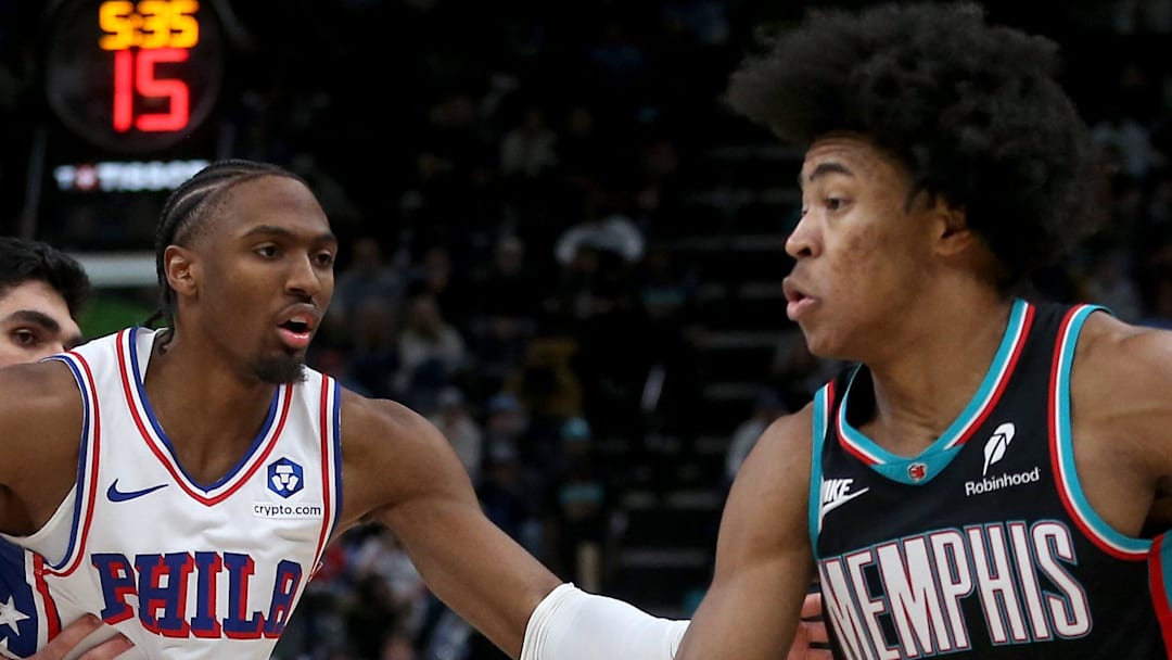 Memphis Grizzlies forward Jaylen Wells dribbles as Philadelphia 76ers guard Tyrese Maxey defends.