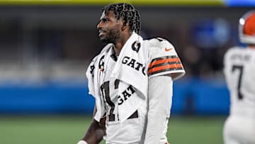 Cleveland Browns quarterback Shedeur Sanders congratulates teammates after a touchdown against the Carolina Panthers