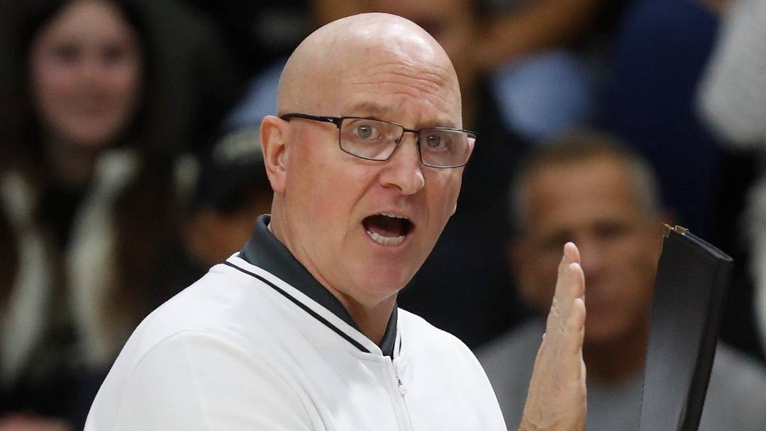 Purdue head coach Dave Shondell yells down the court. Purdue head coach Dave Shondell yells down the court.