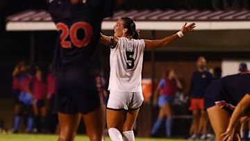 Mississippi State's Ally Perry celebrates a late, game-tying goal against Auburn on Sunday at MSU Soccer Field.