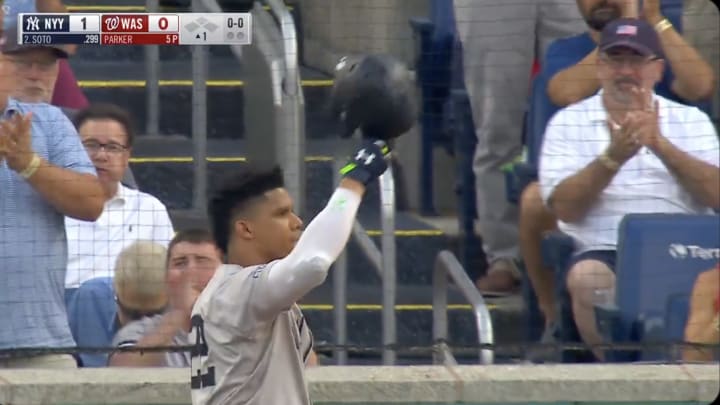 New York Yankees outfielder Juan Soto waves to the crowd at Nationals Park