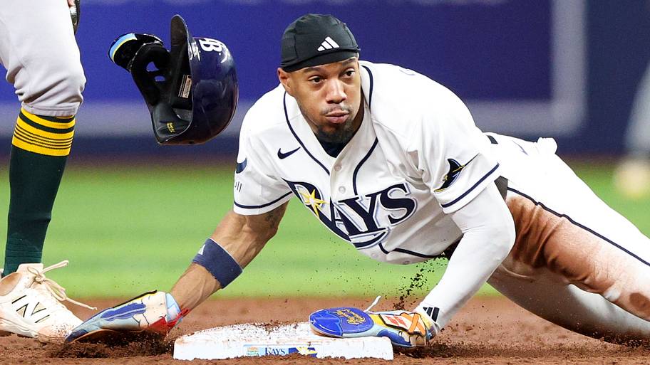 Tampa Bay Rays left fielder Chandler Simpson (14) steals second base