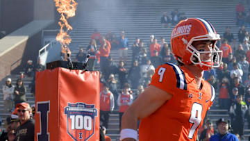 Nov 2, 2024; Champaign, Illinois, USA;  Illinois Fighting Illini quarterback Luke Altmyer (9) is introduced before a game with the Minnesota Golden Gophers during the first half at Memorial Stadium. Mandatory Credit: Ron Johnson-Imagn Images