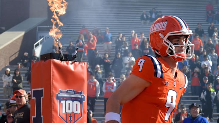 Nov 2, 2024; Champaign, Illinois, USA;  Illinois Fighting Illini quarterback Luke Altmyer (9) is introduced before a game with the Minnesota Golden Gophers during the first half at Memorial Stadium. Mandatory Credit: Ron Johnson-Imagn Images