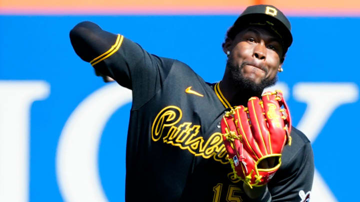 Pittsburgh Pirates center fielder Oneil Cruz (15) tries to throw the ball into the infield before the Mets could score in the first inning, Thursday, March 26, 2026.