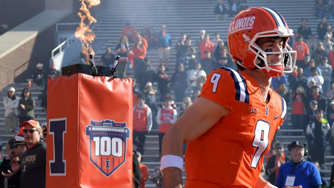 Nov 2, 2024; Champaign, Illinois, USA;  Illinois Fighting Illini quarterback Luke Altmyer (9) is introduced before a game with the Minnesota Golden Gophers during the first half at Memorial Stadium. Mandatory Credit: Ron Johnson-Imagn Images