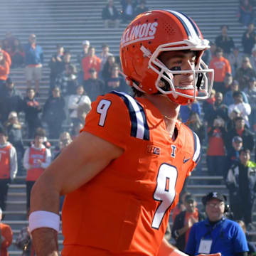 Nov 2, 2024; Champaign, Illinois, USA;  Illinois Fighting Illini quarterback Luke Altmyer (9) is introduced before a game with the Minnesota Golden Gophers during the first half at Memorial Stadium. Mandatory Credit: Ron Johnson-Imagn Images