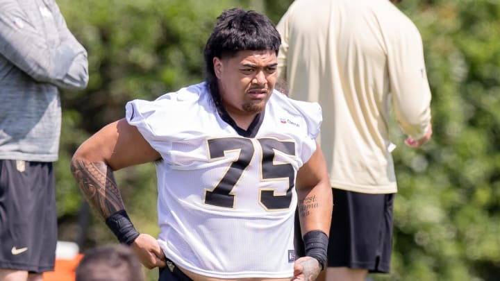 May 11, 2024; New Orleans, LA, USA;  New Orleans Saints offensive tackle Taliese Fuaga (75) looks on during the rookie minicamp at the Ochsner Sports Performance Center. Mandatory Credit: Stephen Lew-USA TODAY Sports