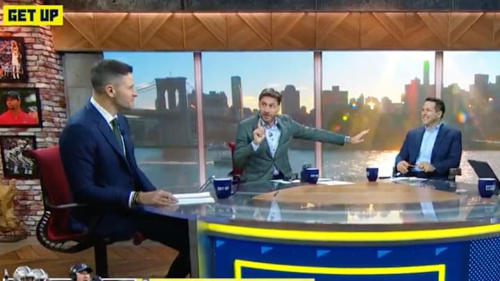 Mike Greenberg breaks out crossing guard routine to direct social media traffic with speculative hot take. Mike Greenberg breaks out crossing guard routine to direct social media traffic with speculative hot take.