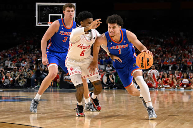Florida guard Walter Clayton Jr. and Houston guard Mylik Wilson.