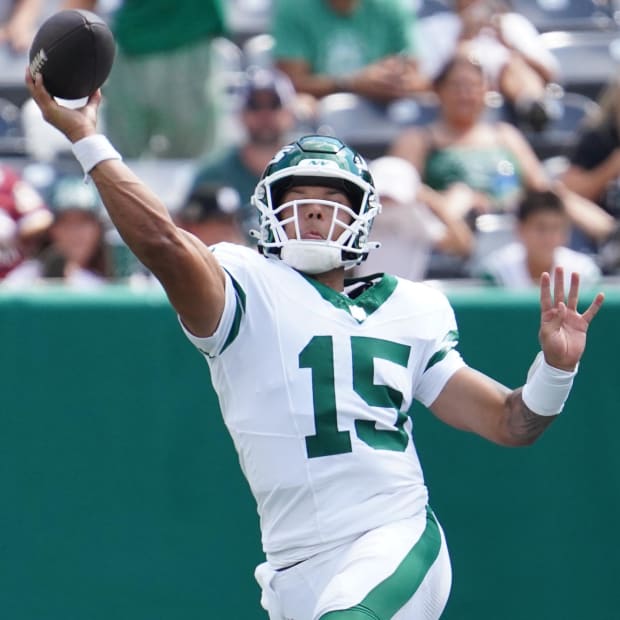 New York Jets quarterback Adrian Martinez (15) passes