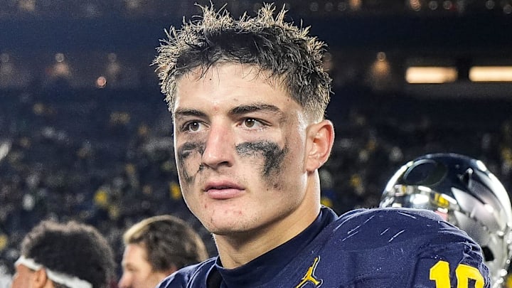 Michigan tight end Colston Loveland (18) walks off the field after 38-17 loss to Oregon at Michigan Stadium