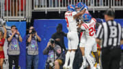 Dec 30, 2023; Atlanta, GA, USA; Mississippi Rebels tight end Caden Prieskorn (86) celebrates with wide receiver Tre Harris (9) and running back Ulysses Bentley IV (24) after a touchdown catch against the Penn State Nittany Lions in the first quarter at Mercedes-Benz Stadium. Mandatory Credit: Brett Davis-USA TODAY Sports
