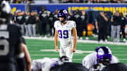 Nate McCashland (99) prepares to kick a field goal against the West Virginia Mountaineers Oct. 25, 2025, at Milan Puskar Stadium in Morgantown, W.Va. / TCU Athletics
