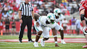 Tulane Defensive Lineman Kameron Hamilton in his old jersey #70 prepares for the next play.