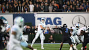 Tulane Quarterback Jake Retzlaff Finds an Open Receiver Downfield against the Memphis Tigers