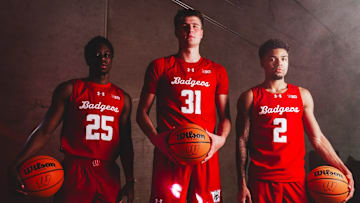 John Blackwell (25), Nolan Winter (31), and Nick Boyd (2) model Wisconsin basketball's alternate jerseys for the 2025-26 season.