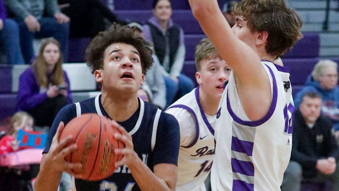 Roncall’s Donovan Cowley (24) eyes the basket against Kiel, Thursday, February 13, 2025, in Kiel, Wis. Roncalli makes a massive jump in the Top 25 and are now considered serious contenders as we head toward the playoffs.