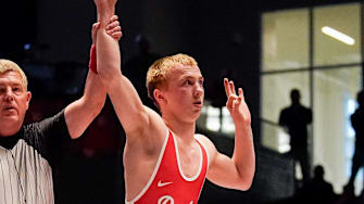 Tennessee state champ Christopher Swann has knocked off two nationally ranked wrestlers to reach the quarterfinals of the Junior Nationals in Fargo, North Dakota.