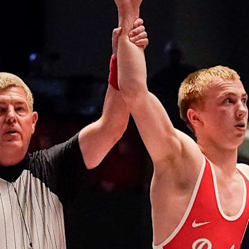 Tennessee state champ Christopher Swann has knocked off two nationally ranked wrestlers to reach the quarterfinals of the Junior Nationals in Fargo, North Dakota.