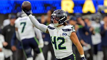 Nov 16, 2025; Inglewood, California, USA; Seattle Seahawks linebacker Drake Thomas (42) celebratesl after recovering a fumble during the second half against the Los Angeles Rams at SoFi Stadium. 