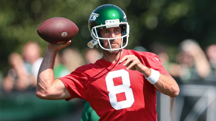 Jul 27, 2024; Florham Park, NJ, USA; New York Jets quarterback Aaron Rodgers (8) throws the ball during training camp at Atlantic Health Jets Training Center.