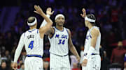 Nov 25, 2025; Philadelphia, Pennsylvania, USA; Orlando Magic guard Anthony Black (0) and center Wendell Carter Jr. (34) and guard Jalen Suggs (4) high-five after a play against the Philadelphia 76ers during the second quarter at Xfinity Mobile Arena. Mandatory Credit: Bill Streicher-Imagn Images
