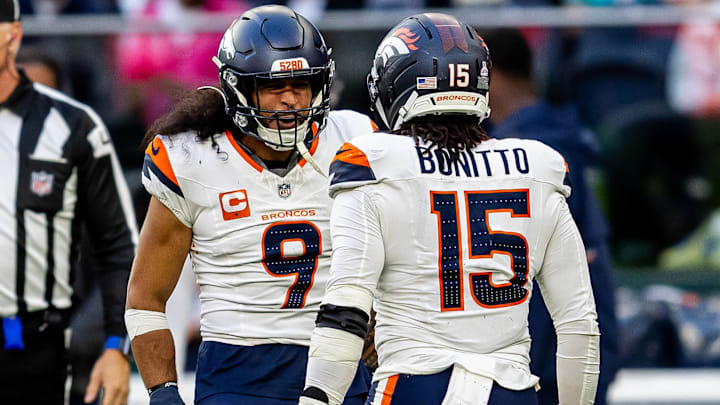 Denver Broncos v New York Jets International Series 12 10 2025. International Series Denver Broncos Defensive back Talanoa Hufanga (9) and Denver Broncos Linebacker Nik Bonitto (15) celebrate a combined tackle during the International Series match between Denver Broncos and New York Jets at Tottenham Hotspur Stadium, London, United Kingdom on 12 October 2025. London Tottenham Hotspur Stadium London United Kingdom.
