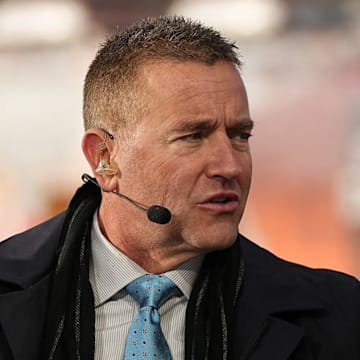 Ohio State head coach Ryan Day talks to Kirk Herbstreit