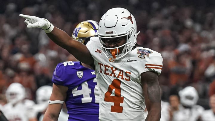 Texas Longhorns running back CJ Baxter (4) celebrates a first down during the Sugar Bowl College Football Playoff  semifinals game against the Washington Huskies at the Caesars Superdome on Monday, Jan. 1, 2024 in New Orleans, Louisiana.