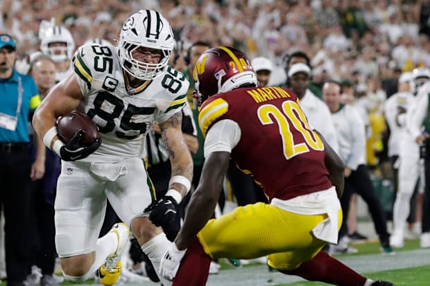 Green Bay Packers tight end Tucker Kraft carries the ball during a game against the Washington Commanders. 