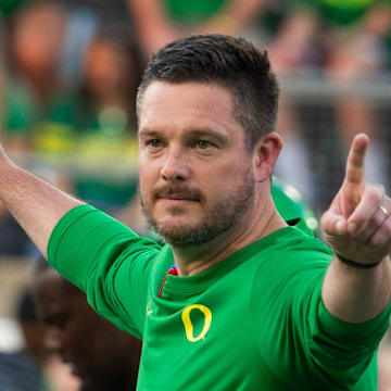 Oregon coach Dan Lanning oversees warmups before the game against Boise State at Autzen in Eugene Sept. 7, 2024