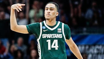 Michigan State guard Davis Smith (14) celebrates a three point basket against Mississippi State during the second half of NCAA tournament West Region first round at Spectrum Center in Charlotte, N.C. on Thursday, March 21, 2024.