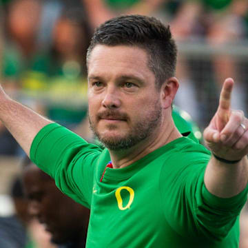 Oregon coach Dan Lanning oversees warmups before the game against Boise State at Autzen in Eugene Sept. 7, 2024