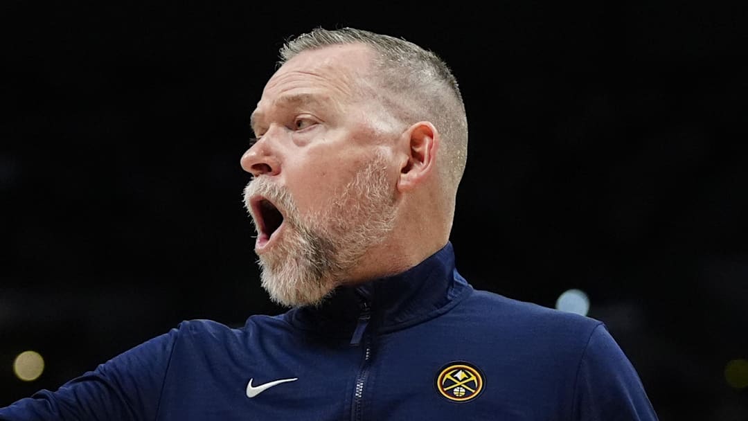 Apr 6, 2025; Denver, Colorado, USA; Denver Nuggets head coach Michael Malone reacts in the second half against the Indiana Pacers at Ball Arena. Mandatory Credit: Ron Chenoy-Imagn Images