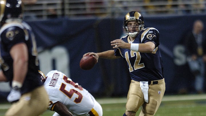 St. Louis Rams quarterback Ryan Fitzpatrick (12) attempts a pass against Washington at the Edward Jones Dome. St. Louis Rams quarterback Ryan Fitzpatrick (12) attempts a pass against Washington at the Edward Jones Dome.